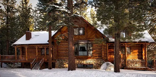 difference between chinking and caulking log cabin