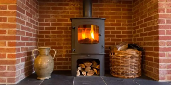 Can I Install Wood Burning Stove in Basement to heat whole house	